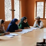Home 23 회복적 정의의 철학적 기초 존중과 신뢰 - A community mediation session in a traditional Pakistani setting, showing diverse men and women in m...